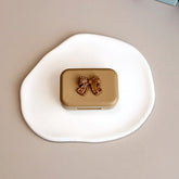 Estuche pequeño para lentes de contacto de color té con leche