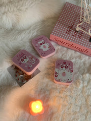 Estuche para lentes de contacto de color con un lindo gato rosa