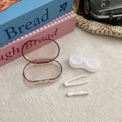 Estuche portátil sencillo para lentes de contacto de colores