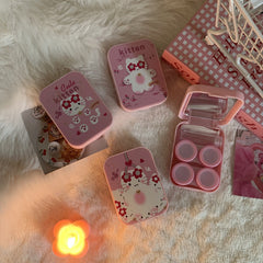 Estuche para lentes de contacto de color con un lindo gato rosa