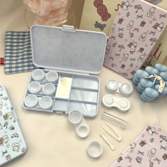 Estuche para lentes de contacto de colores con diseño de flores y cachorros