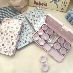 Estuche para lentes de contacto de colores con diseño de flores y cachorros