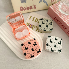 Estuche para lentes de contacto de colores con lazo floral y forma de gato 