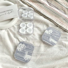 Estuche para lentes de contacto de colores con diseño de pez a rayas de caramelo 