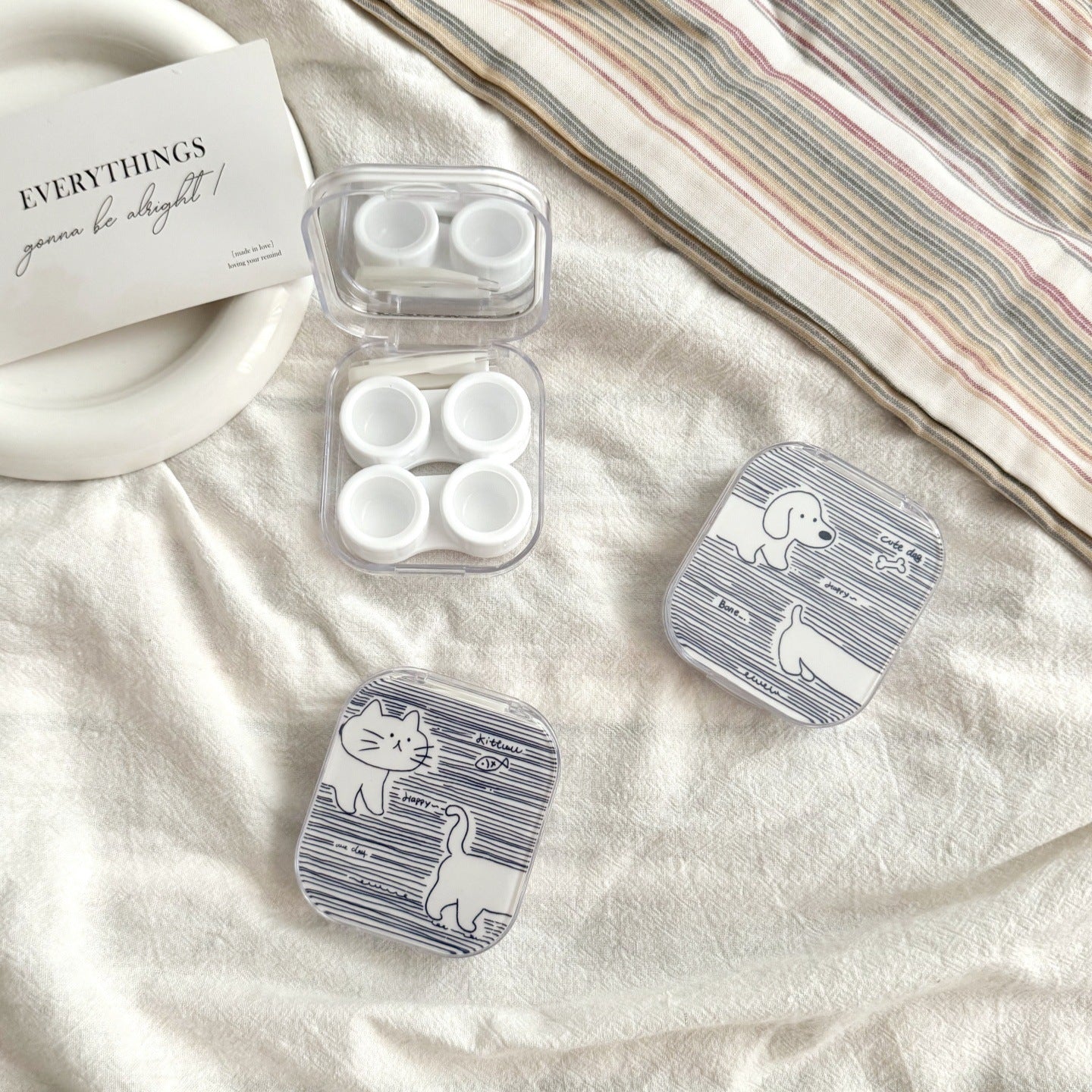 Estuche para lentes de contacto de colores con diseño de pez a rayas de caramelo 