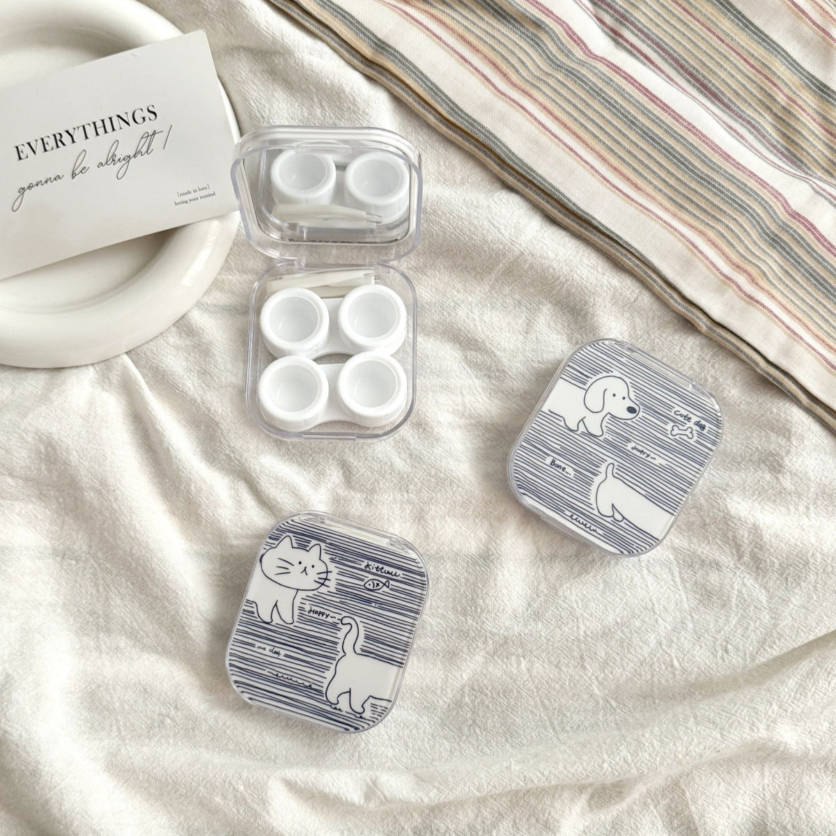 Estuche para lentes de contacto de colores con diseño de pez a rayas de caramelo 