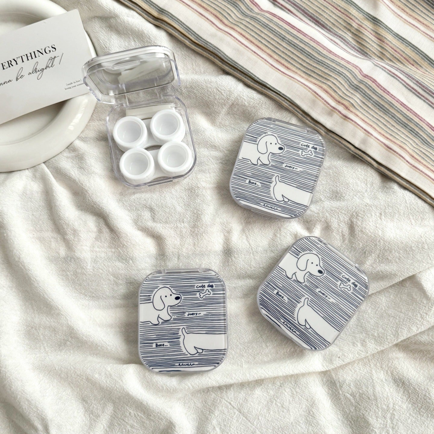 Estuche para lentes de contacto de colores con diseño de pez a rayas de caramelo 