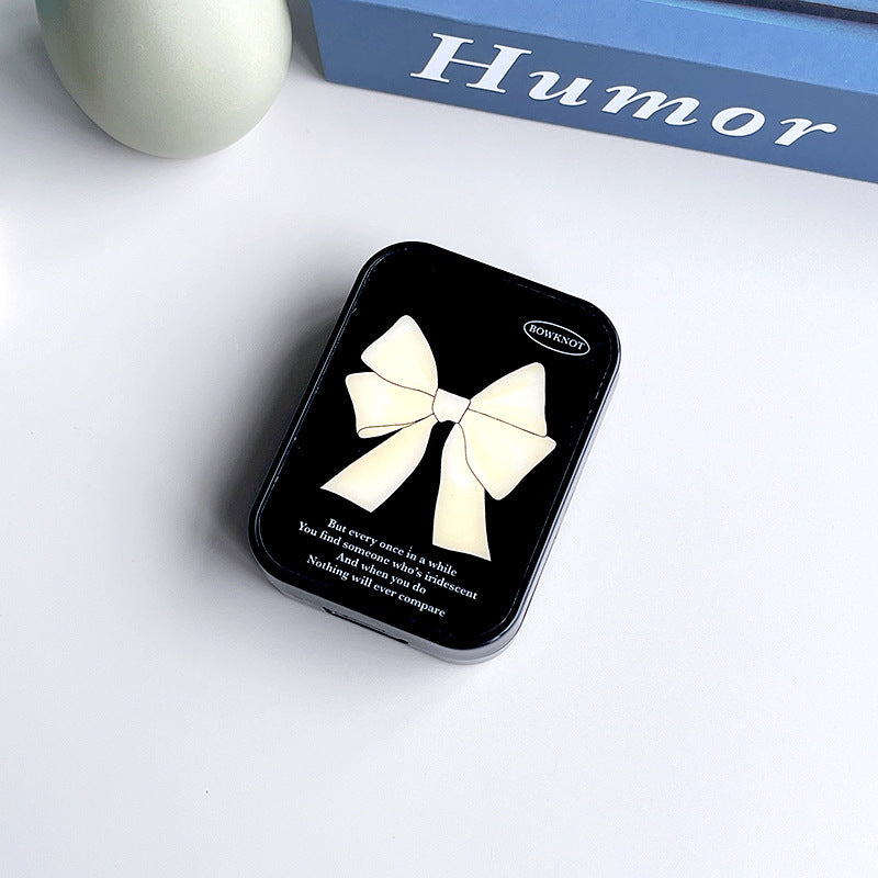 Estuche minimalista con lazo para lentes de contacto de colores 