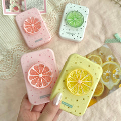 Estuche para lentes de contacto de colores con diseño de rodaja de fruta