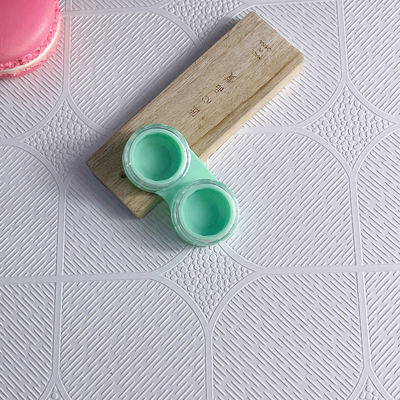 Estuche para lentes de contacto de color contraído 