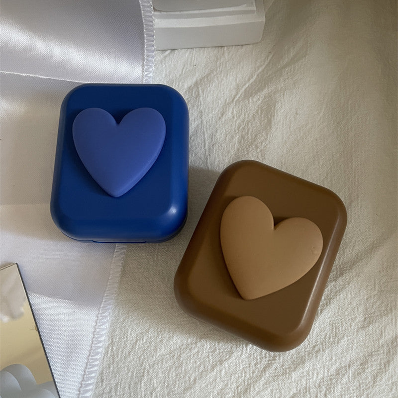 Estuche para lentes de contacto de color con forma de corazón 