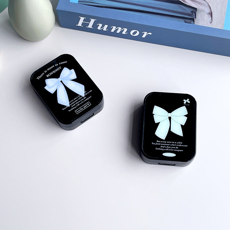 Estuche minimalista con lazo para lentes de contacto de colores 