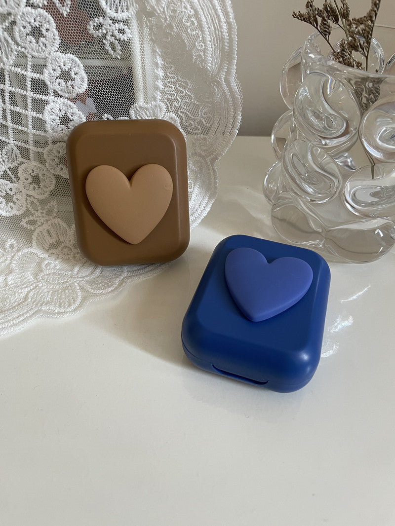 Estuche para lentes de contacto de color con forma de corazón 